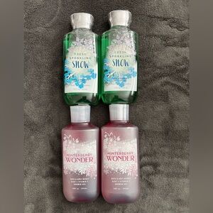 4 bottles of Bath and Body Works shower gel